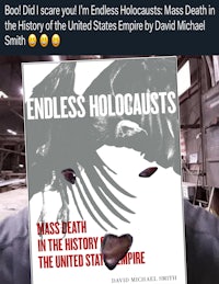 a man is holding a book with the title endless holocaust