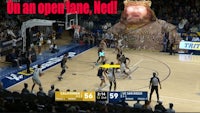 an image of an open face neel on a basketball court