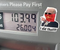 a sticker on a gas pump with a man wearing a red bandana